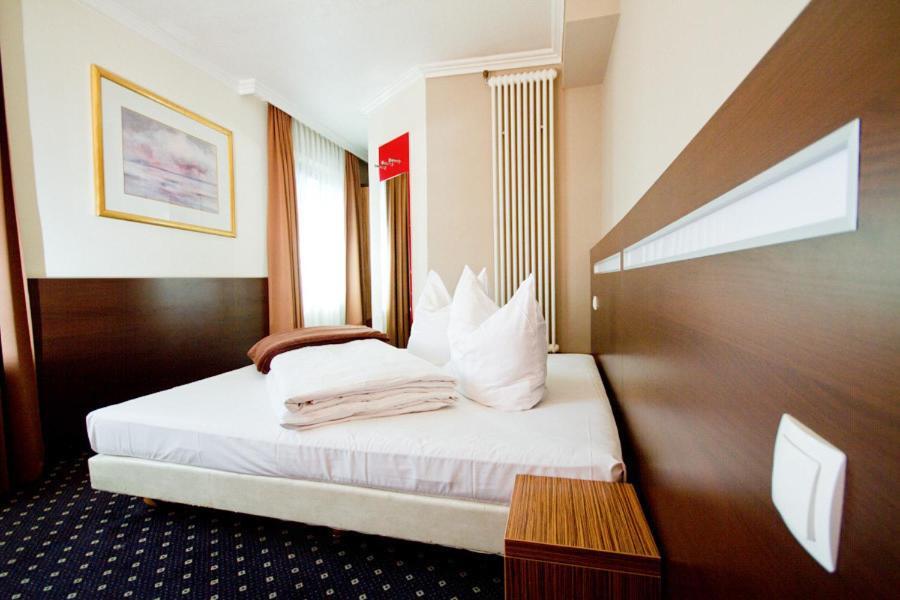 Hotel Tourist Frankfurt pe Main Cameră foto